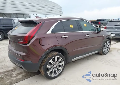 2022 Cadillac Xt4 Fwd Premium Luxury from USA, damaged, VIN 1GYFZCR4XNF116845